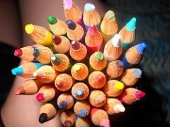 Handful of colored pencils of various colors